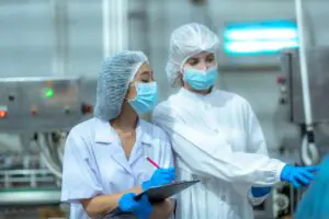 inspectors at a drug manufacturing plant