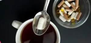 can i take coffee with iron?