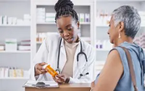 woman talking to pharmacist