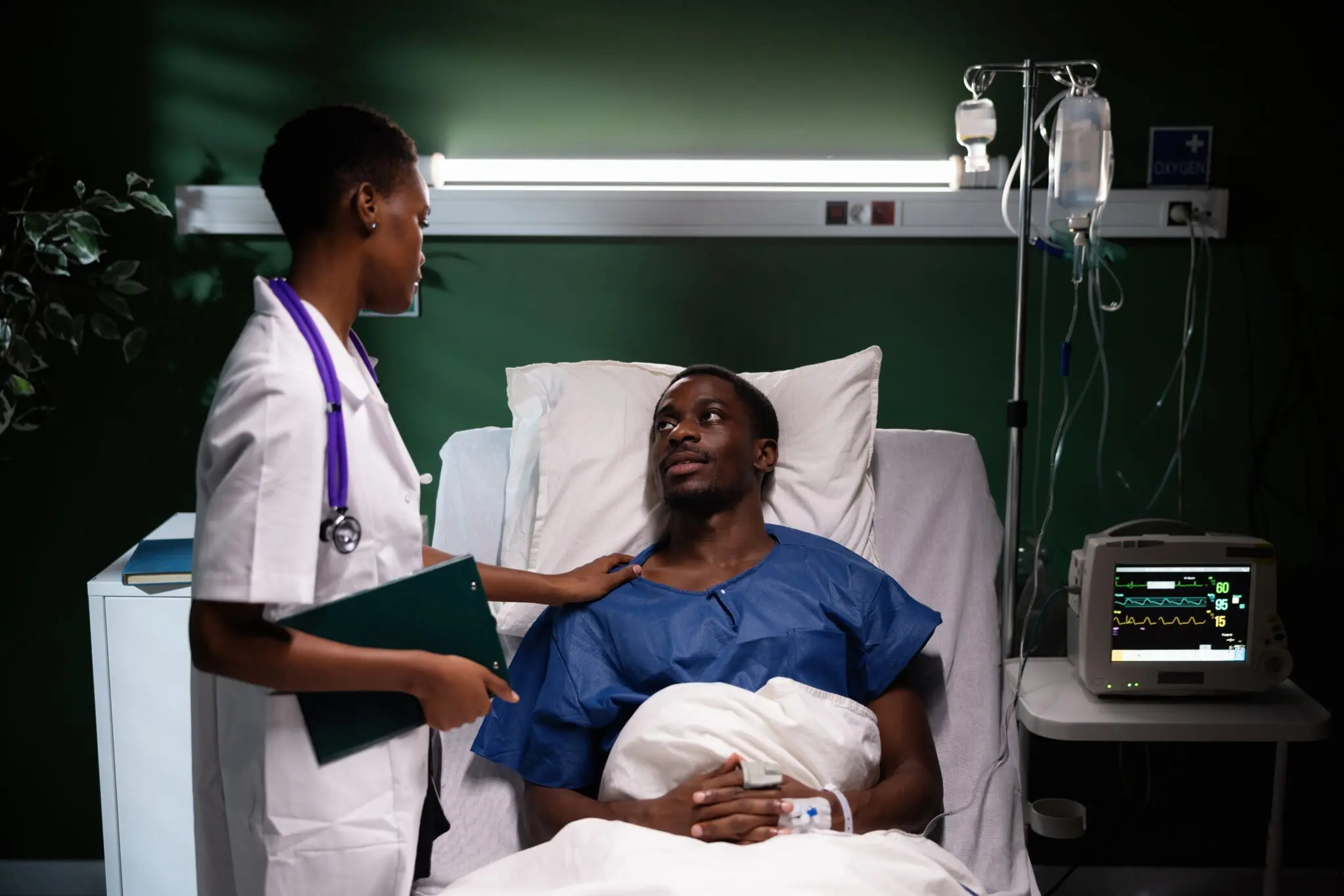 male patient talking to female doctor