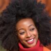 happy woman with afro