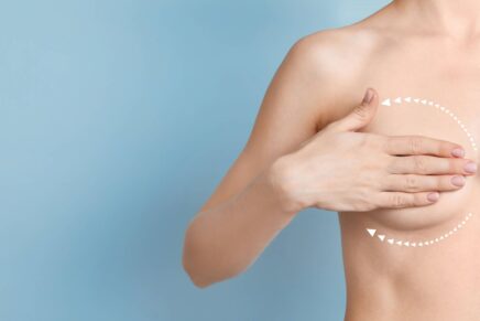 women demonstrating breast implant warning