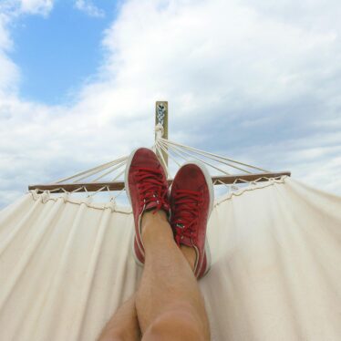 person relaxing in hammock, lifestyle changes to lower blood pressure