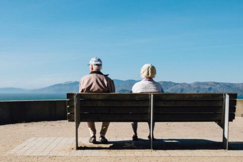 people on a bench wondering about new alzheimer's drugs