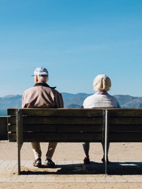 people on a bench wondering about new alzheimer's drugs