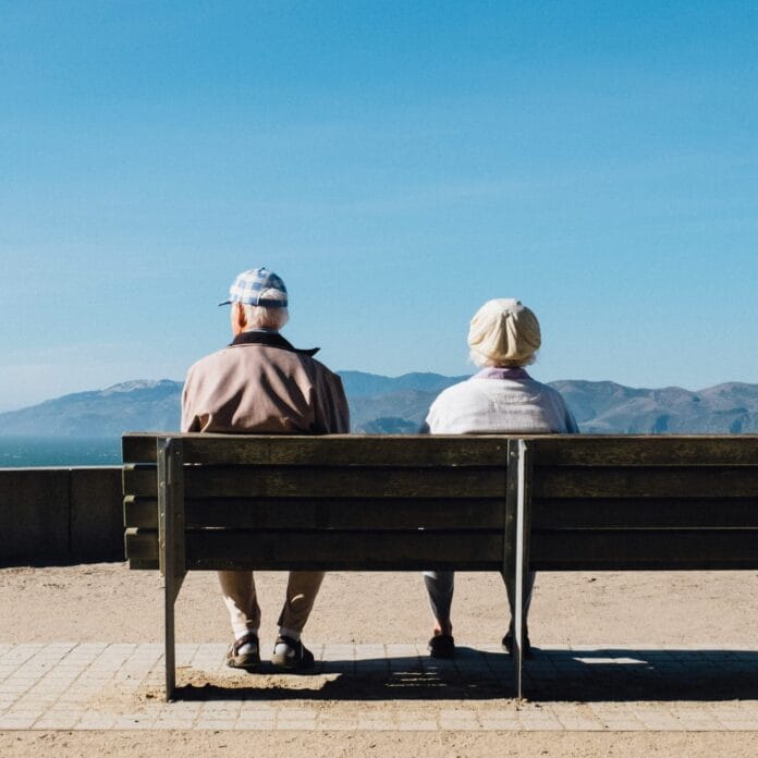 people on a bench wondering about new alzheimer's drugs