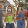 group of friends with masks on