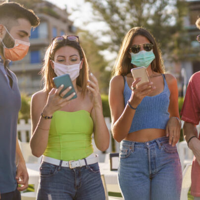 group of friends with masks on