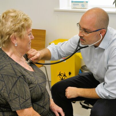 doctor diagnosing obesity listening to heart