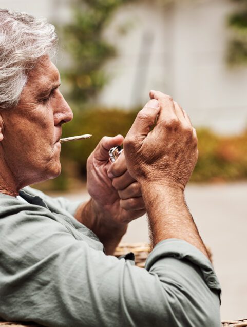 Reckoning With The Complicated Side Effects Of Cannabis, older man smoking cannabis