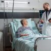 Journavx new painkiller opioid substitute, older woman in a hopsital bed