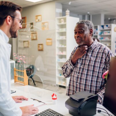 pharmacist talking to person