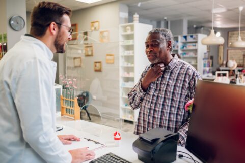 pharmacist talking to person