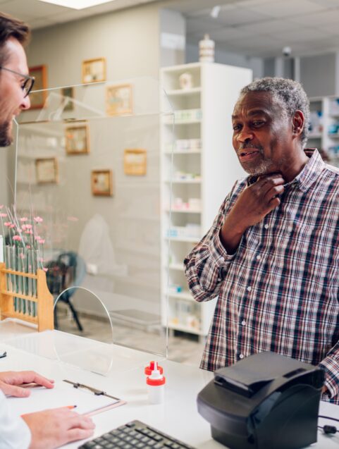 pharmacist talking to person