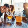 friends drinking at brewery,