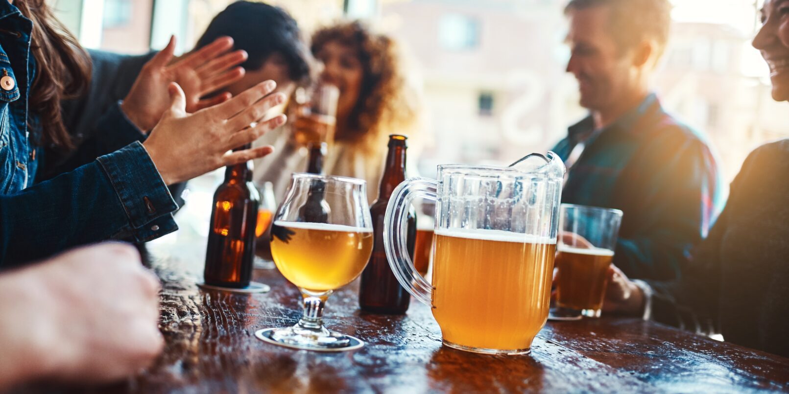 friends drinking at brewery,