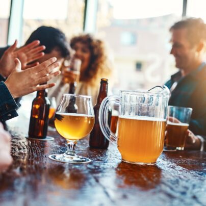 friends drinking at brewery,