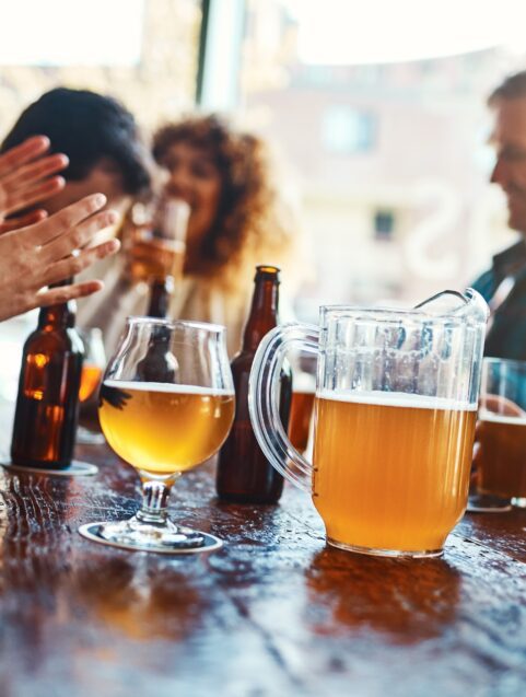 friends drinking at brewery,