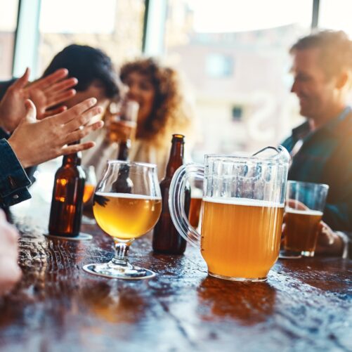 friends drinking at brewery,