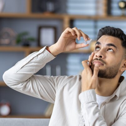 man putting in eye drops, eye drop recall