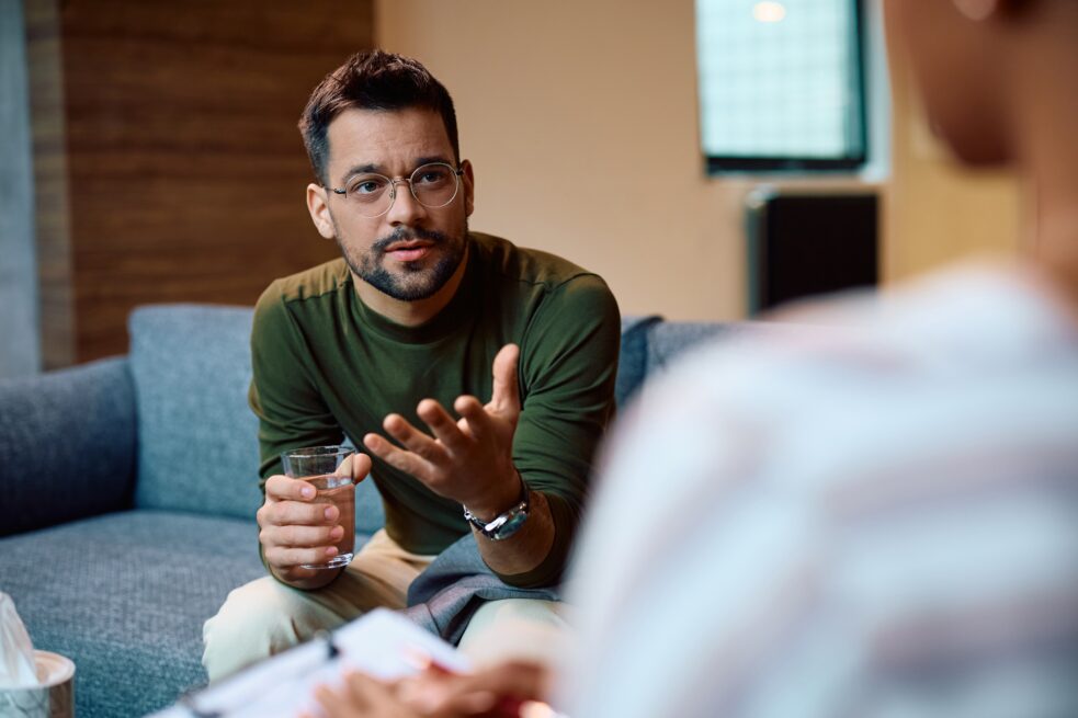 man talking to psychiatrist about antidepressants