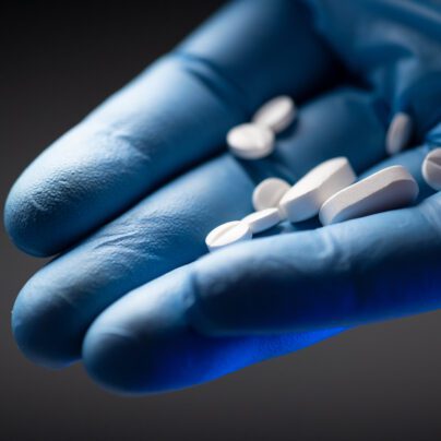 Two-Thirds of Americans Would Pay More for Safer Drugs. hand holding medication