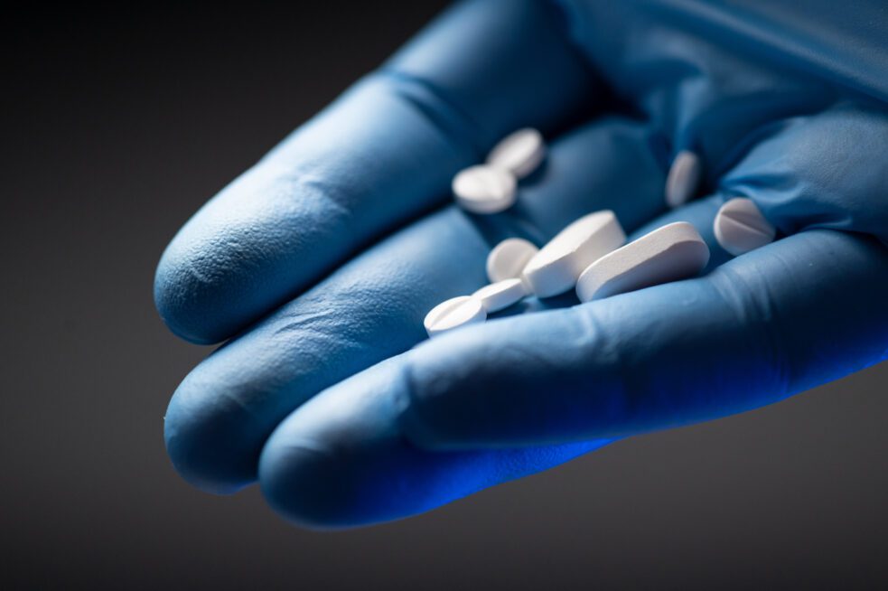 Two-Thirds of Americans Would Pay More for Safer Drugs. hand holding medication