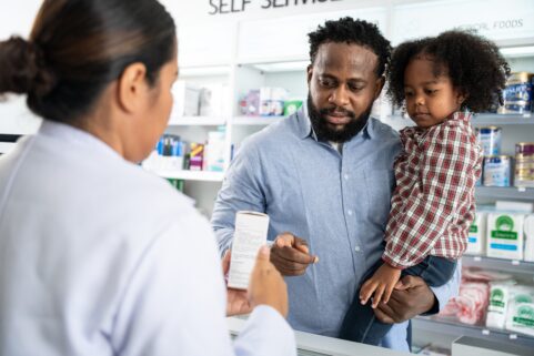 Pharmacist talking to family