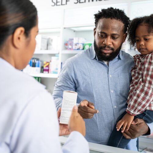 Pharmacist talking to family
