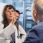 man at doctors getting an eye exam