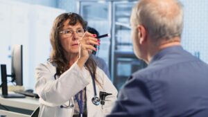 man at doctors getting an eye exam