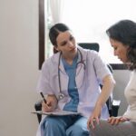 woman talking to doctor about osteoporosis