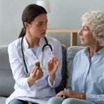 doctor talking to older woman
