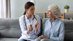doctor talking to older woman