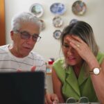 older couple looking at computer