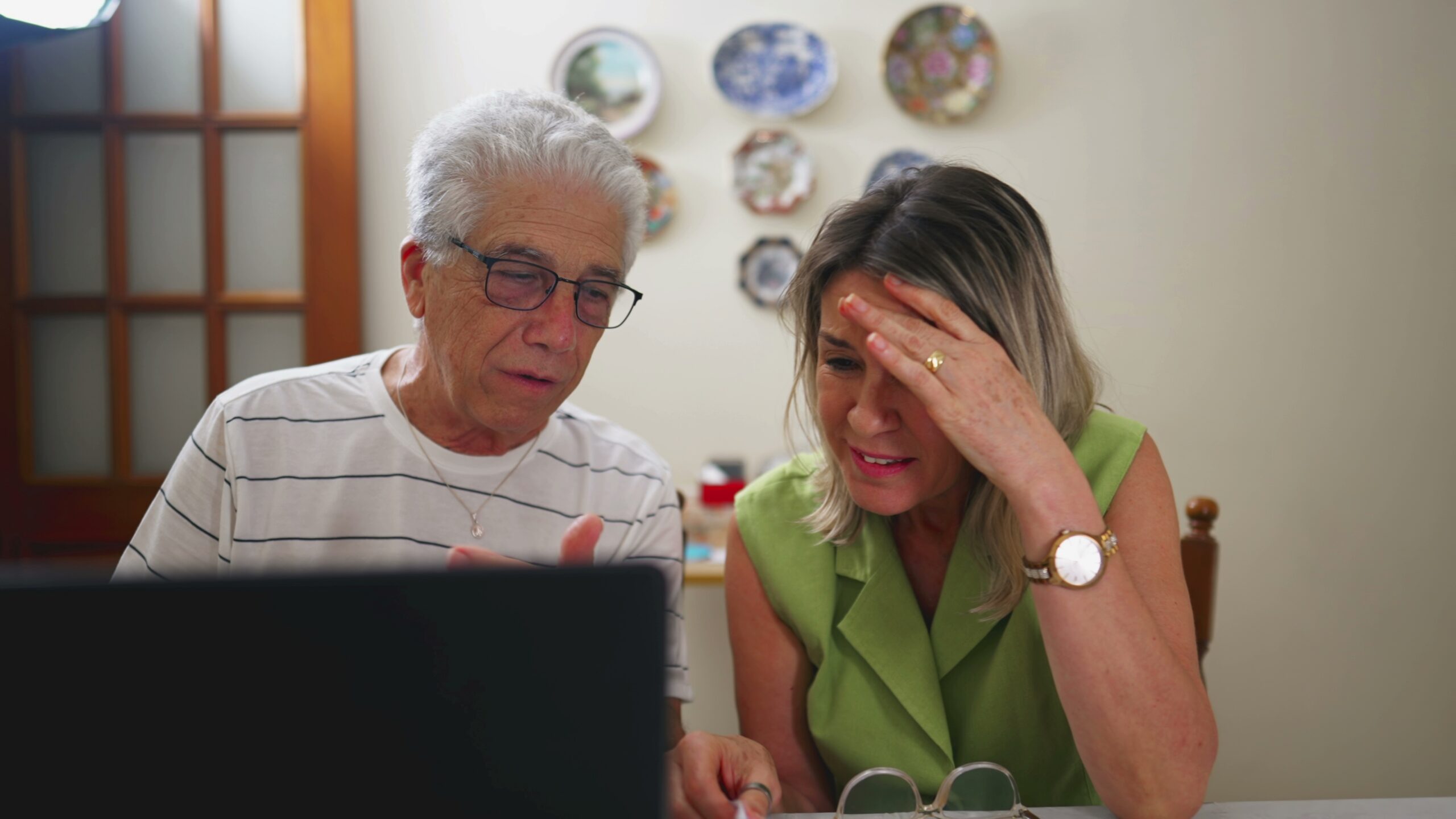 older couple looking at computer