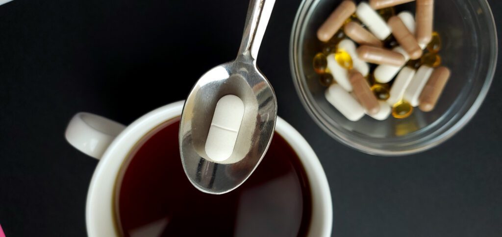 can i take coffee with iron?