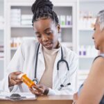 woman talking to pharmacist