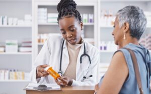 woman talking to pharmacist